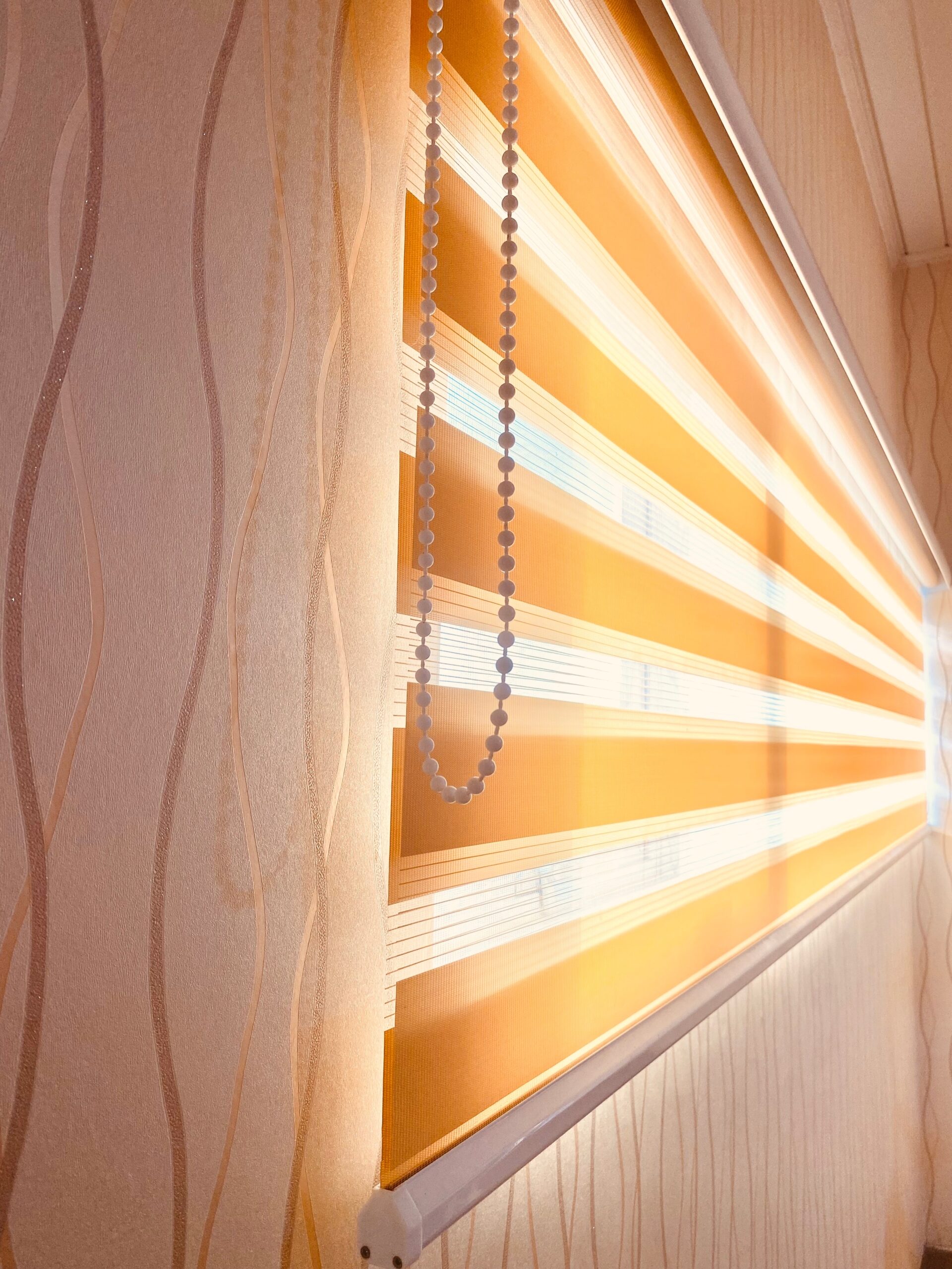 Morning,Sunlight,Passing,Through,The,Zebra,Blinds
